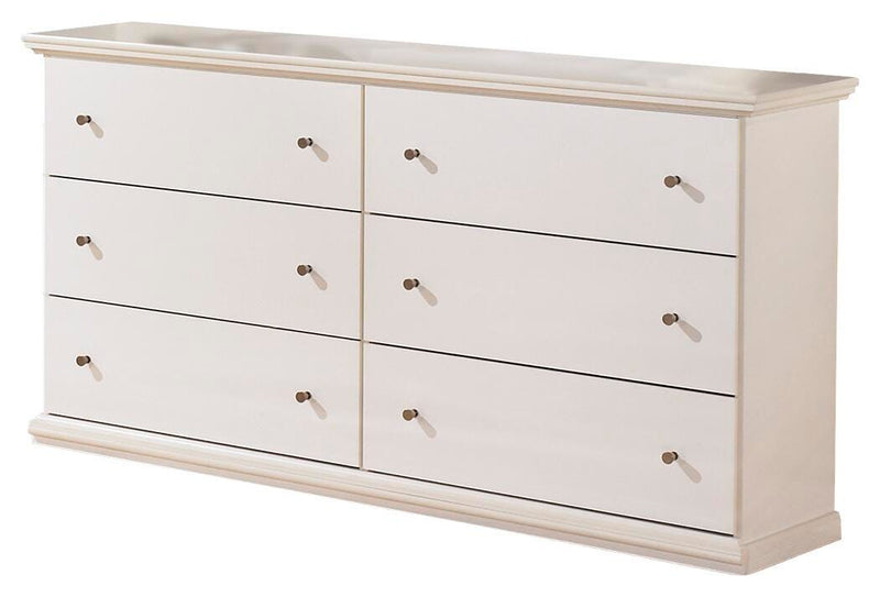 Ashley Furniture Bostwick Shoals Youth Dresser with multiple drawers and a dark wood finish, shown in a well-lit room setting.