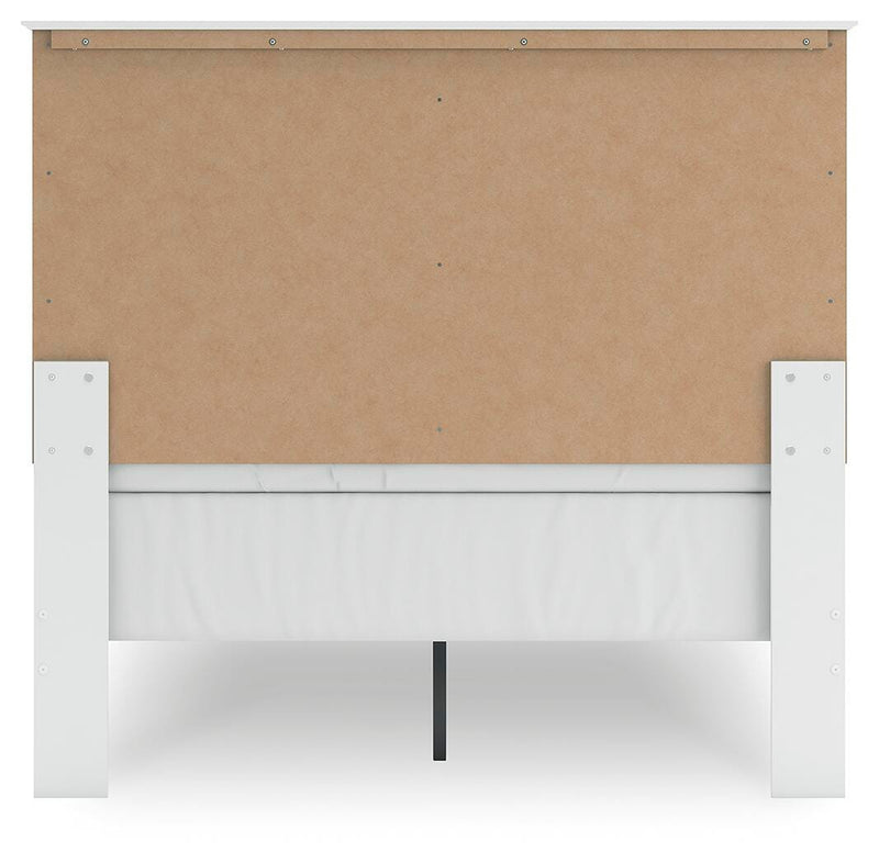 Ashley Furniture Bostwick Shoals Bed with a dark wood finish and classic design, shown from the back view.