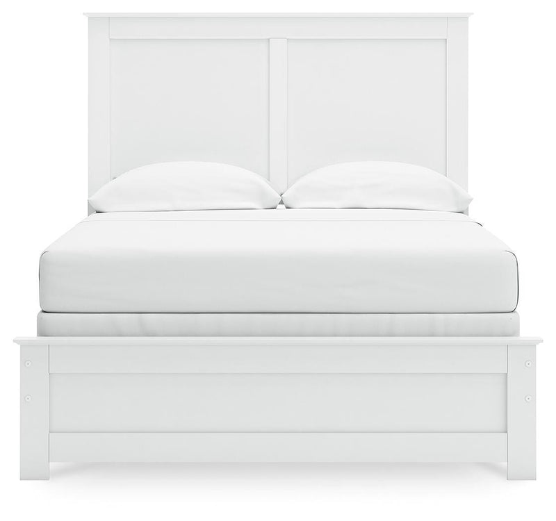 Ashley Furniture Bostwick Shoals bedroom set featuring a headboard with upholstered details and coordinating nightstands.