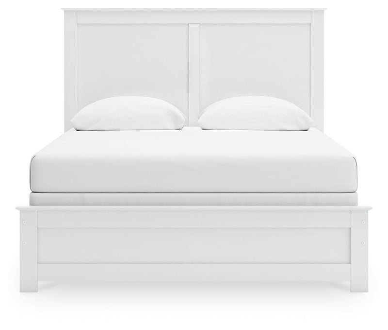 Ashley Furniture Bostwick Shoals bedroom set with a headboard and matching bedroom furniture in a warm, classic design.
