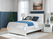 Ashley Furniture Bostwick Shoals Bed with a classic wooden frame and stylish headboard in a warm finish.