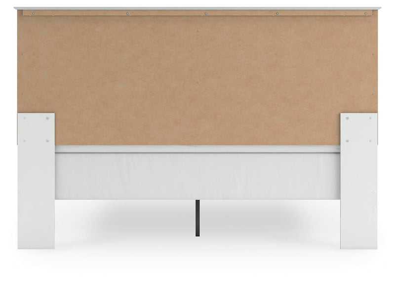 Ashley Furniture Bostwick Shoals bedroom set featuring a bed frame, nightstands, and dresser in a modern bedroom design.
