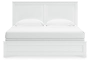 Ashley Furniture Bostwick Shoals bed with a headboard featuring a neutral upholstered design and stylish wooden accents.