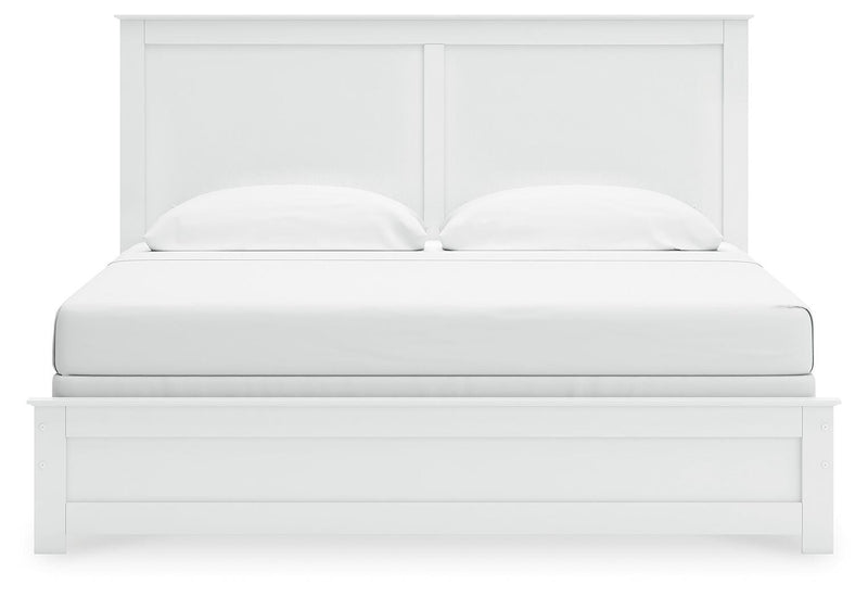 Ashley Furniture Bostwick Shoals bed with a headboard featuring a neutral upholstered design and stylish wooden accents.