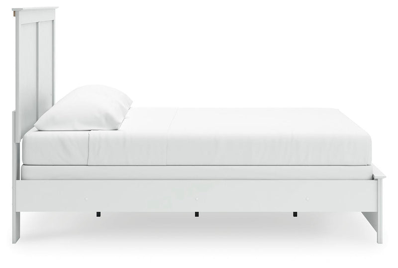 Ashley Furniture Bostwick Shoals bed with a wooden frame and neutral-toned upholstery, shown from a side view.