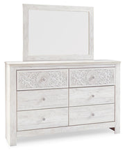 Ashley Furniture Paxberry youth bedroom set with bed, dresser, and nightstand in a modern design, shown from a side angle.