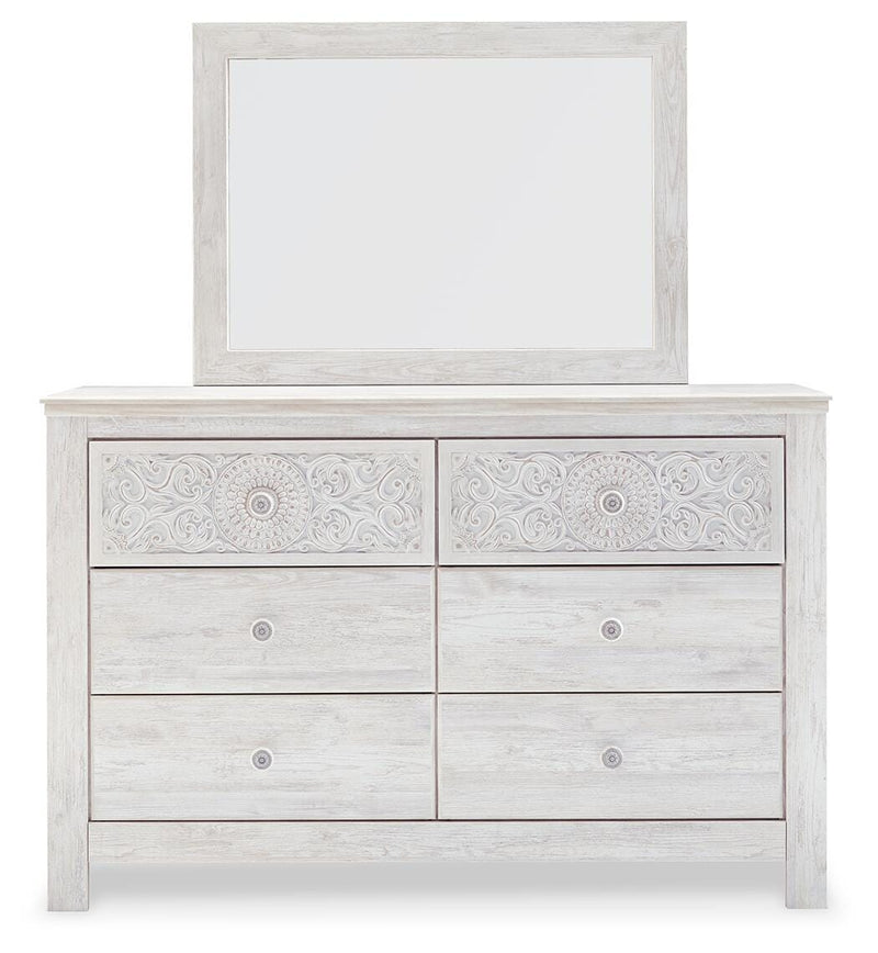 Ashley Furniture Paxberry youth bedroom set with a headboard, dresser, and nightstand in a modern bedroom setup.
