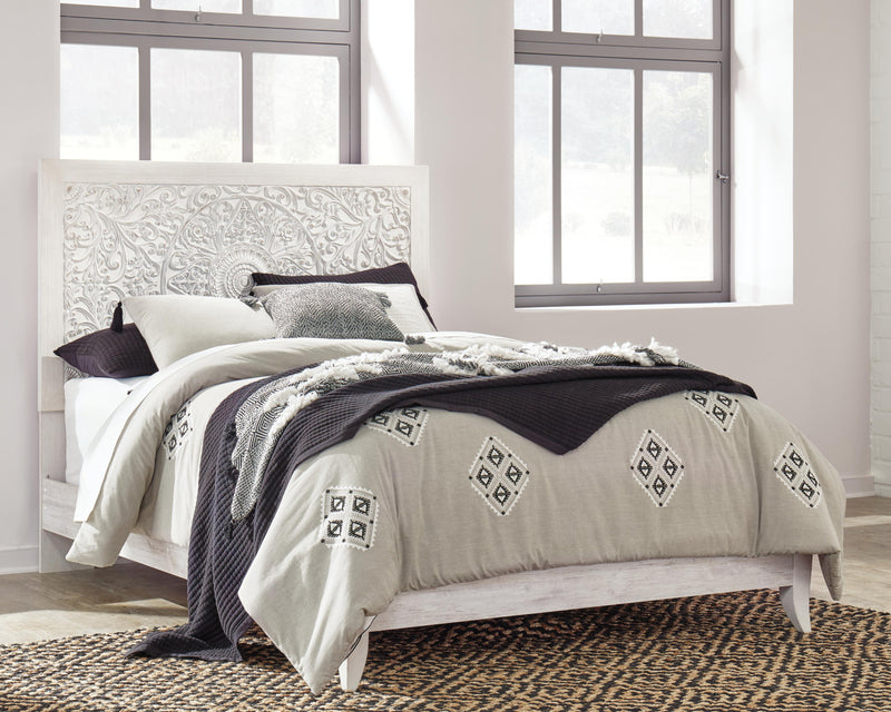 Ashley Furniture Paxberry youth bedroom set featuring a bed, dresser, and nightstand with a rustic wood finish.