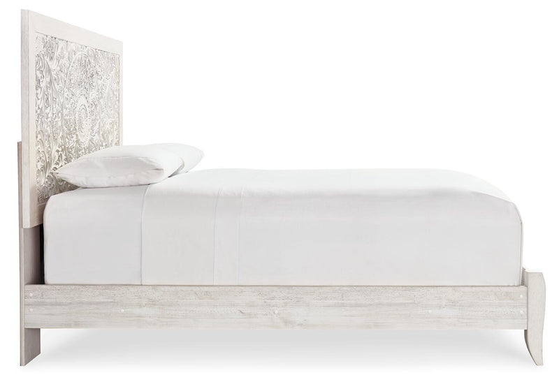 Ashley Furniture Paxberry youth bedroom set with bed, dresser, and nightstand in a modern bedroom scene.