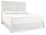 Ashley Furniture Paxberry youth bedroom set with a bed, dresser, and nightstand shown from an angled view.