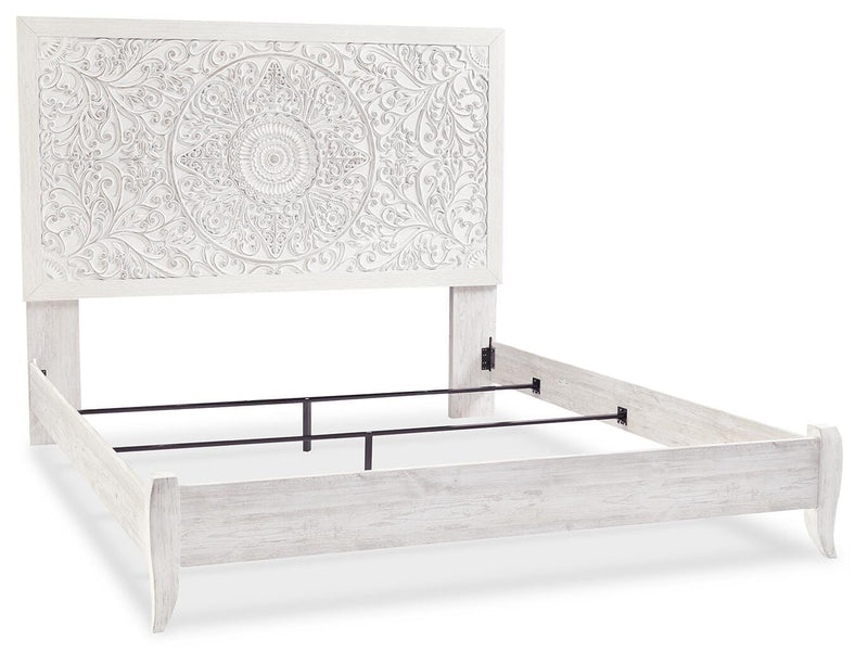 Ashley Furniture Paxberry youth bedroom set featuring a bed, dresser, and nightstand in a modern bedroom scene.