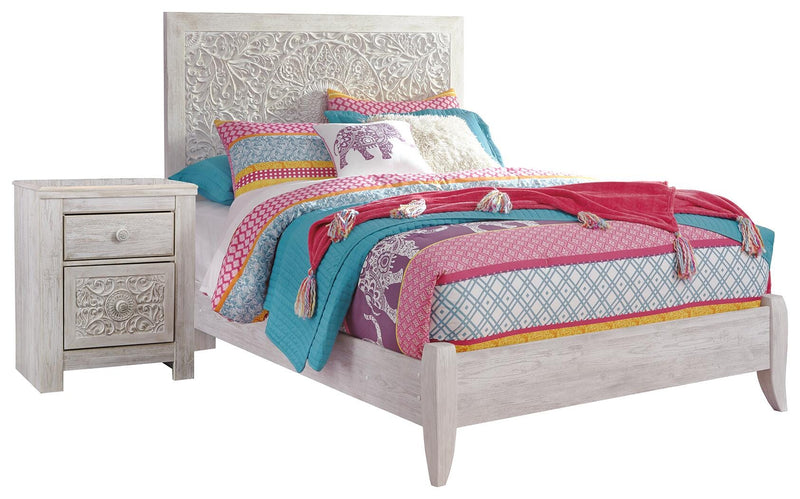 Ashley Furniture Paxberry youth bedroom set with a bed, dresser, and nightstand in a modern design, shown in a cozy bedroom setting.