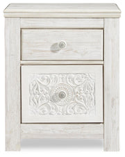 Ashley Furniture Paxberry youth bedroom set with headboard, featuring a modern design in a cozy bedroom scene.