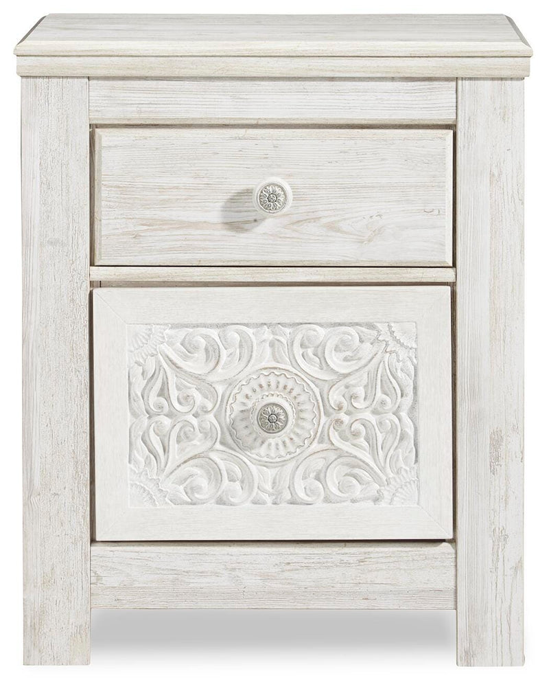 Ashley Furniture Paxberry youth bedroom set with headboard, featuring a modern design in a cozy bedroom scene.