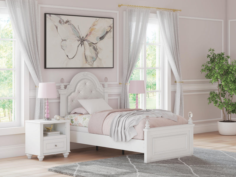 Ashley Furniture Kozlani upholstered bed with a padded headboard and neutral fabric, showcasing a stylish and comfortable bedroom centerpiece.
