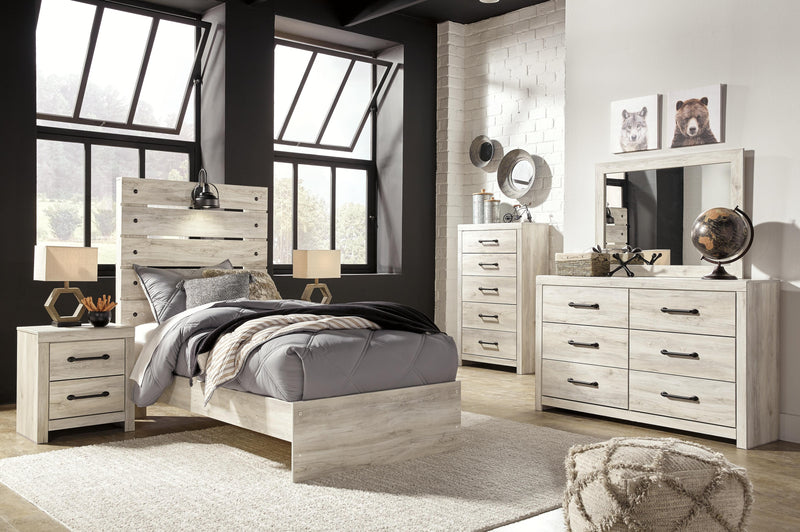 Ashley Furniture Cambeck Bed showcasing a modern wooden bed frame with a sleek headboard and natural wood finish.