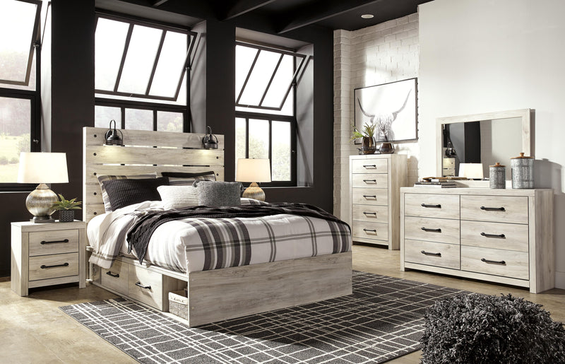 Ashley Furniture Cambeck Bed with built-in storage drawers, featuring a sturdy frame and spacious under-bed storage.