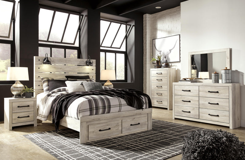 Ashley Furniture Cambeck bed with two storage drawers, featuring a sleek modern design and a warm wood finish.
