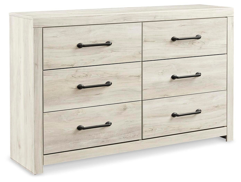 Ashley Furniture Cambeck dresser with matching mirror, featuring a sleek wooden finish and modern design, shown from an angled side view.