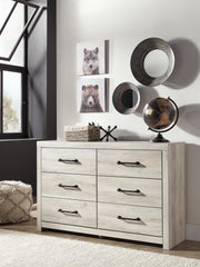 Ashley Furniture Cambeck Dresser featuring multiple drawers and a dark wood finish for a modern bedroom storage solution.