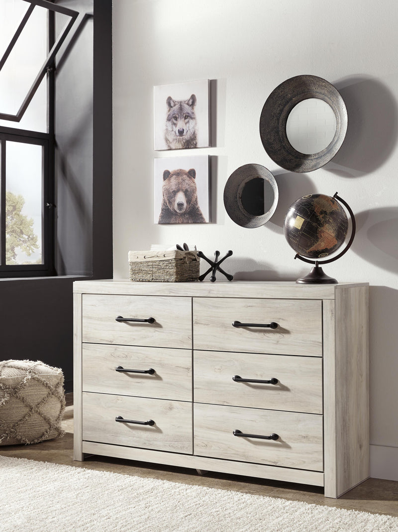 Ashley Furniture Cambeck Dresser featuring multiple drawers and a dark wood finish for a modern bedroom storage solution.