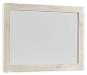 Ashley Furniture Cambeck dresser with attached mirror, featuring a modern wood finish and sleek hardware, shown from an angled side view.