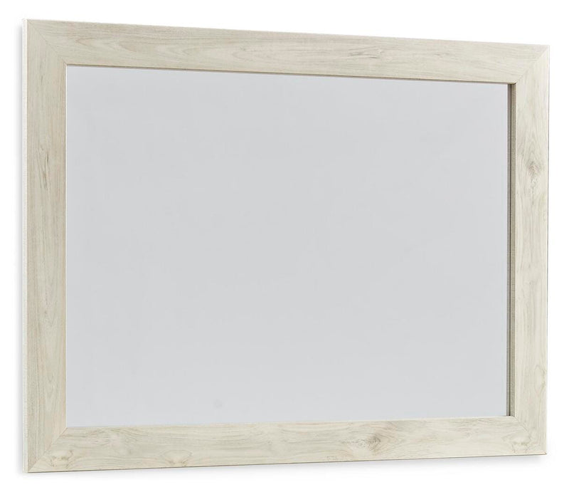 Ashley Furniture Cambeck dresser with attached mirror, featuring a modern wood finish and sleek hardware, shown from an angled side view.
