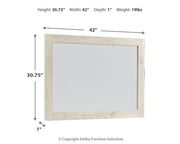 Ashley Furniture Cambeck dresser with matching mirror, wooden finish, and modern design for bedroom storage and decor.