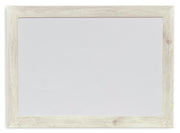 Ashley Furniture Cambeck bedroom mirror with a sleek rectangular design and a polished wood frame visible in the image.