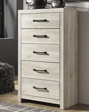 Ashley Furniture Cambeck chest of drawers with a sleek wood finish and multiple storage drawers.