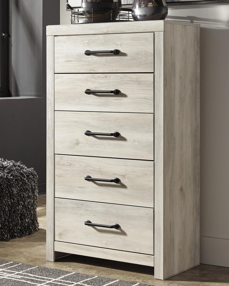 Ashley Furniture Cambeck chest of drawers with a sleek wood finish and multiple storage drawers.