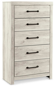 Ashley Furniture Cambeck chest of drawers with a dark wood finish, shown from an angled side view.