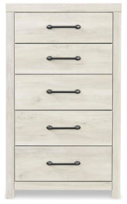Ashley Furniture Cambeck chest of drawers with six spacious drawers and sleek wood finish, shown from a front head-on view.