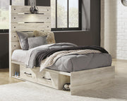Ashley Furniture Cambeck bed with two storage drawers, featuring a sturdy frame and built-in functional storage drawers.