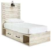 Ashley Furniture Cambeck bed with two storage drawers, showing a stylish wooden bed frame from a side angle.