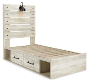 Ashley Furniture Cambeck bed with two storage drawers, showcasing a wooden bed frame with built-in storage underneath.