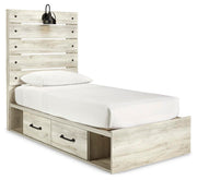 Ashley Furniture Cambeck bed with four storage drawers, showcasing a modern wooden bed frame with ample under-bed storage.