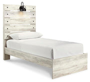 Ashley Furniture Cambeck Bed with a sleek wooden frame and modern design, shown from an angled view.