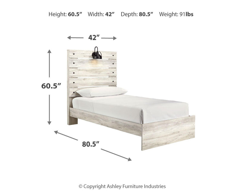 Ashley Furniture Cambeck Bed showing a sturdy wooden frame with a classic design and neutral finish.