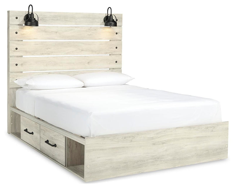 Ashley Furniture Cambeck bed with two storage drawers, shown from an angled side view in a modern bedroom setting.