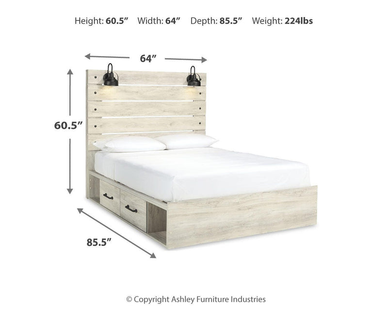 Ashley Furniture Cambeck bed with two storage drawers, wooden frame, and neutral finish, shown with mattress and bedding.