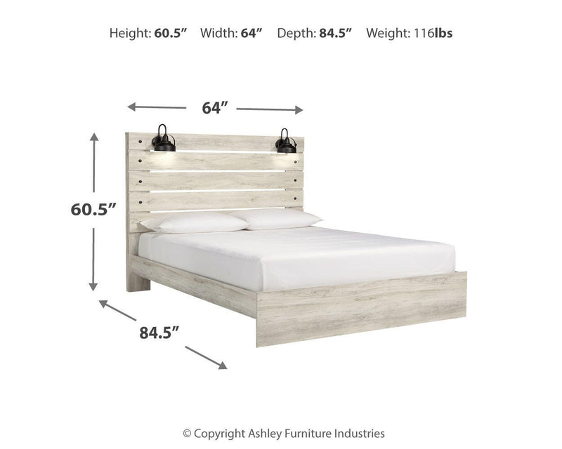 Ashley Furniture Cambeck Bed with wooden frame and upholstered headboard, detailed close-up of the bed's design and finish.