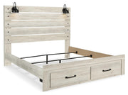 Ashley Furniture Cambeck bed with two storage drawers in a natural wood finish, showcasing the bed frame and built-in storage drawers.