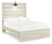 Ashley Furniture Cambeck Bed with a sleek wooden frame, shown from an angled side view highlighting its modern design.
