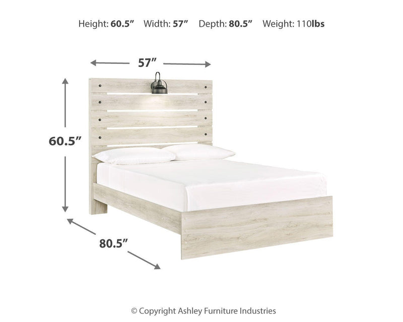 Ashley Furniture Cambeck Bed with upholstered headboard and wooden frame, shown in a modern bedroom setting.