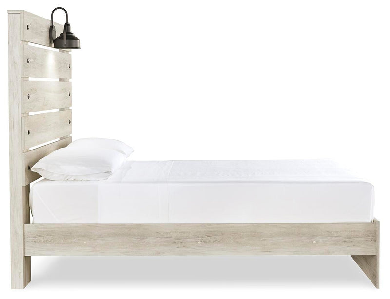 Ashley Furniture Cambeck Bed shown from side view with sleek design and neutral upholstery, perfect for a modern bedroom.