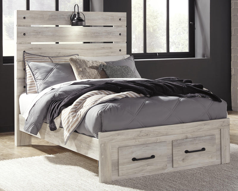 Ashley Furniture Cambeck bed with two storage drawers, featuring a modern design and a sturdy wooden frame.
