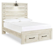Ashley Furniture Cambeck bed with built-in storage drawers, shown from an angled side view in a modern bedroom setting.
