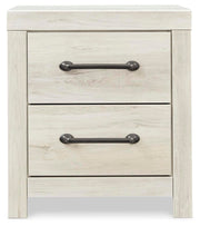 Ashley Furniture Cambeck nightstand with a sleek wood finish and modern design, featuring a single drawer and open shelf.