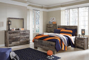 Ashley Furniture Derekson Youth Bed in dark wood finish, showcasing a sturdy, stylish bed frame with clean lines and traditional design.